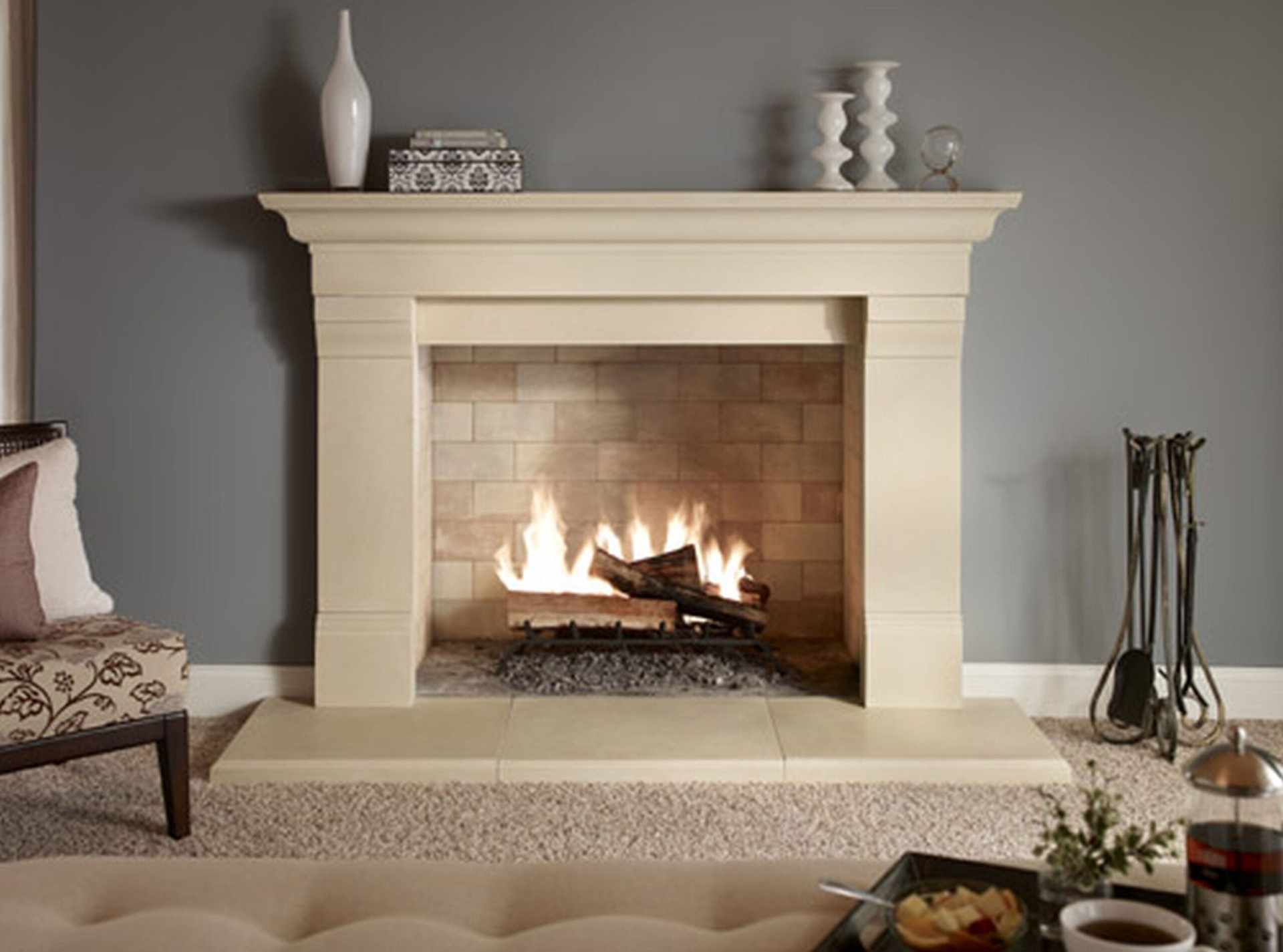 Elegant vent-free gas fireplace with beige mantel in a modern living room in St. Louis, MO